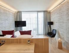 Loisium Wine Spa Hotel Langenlois Beispiel eines Doppelzimmers mit Sichtbeton im Loisium Wine Spa Hotel Langenlois